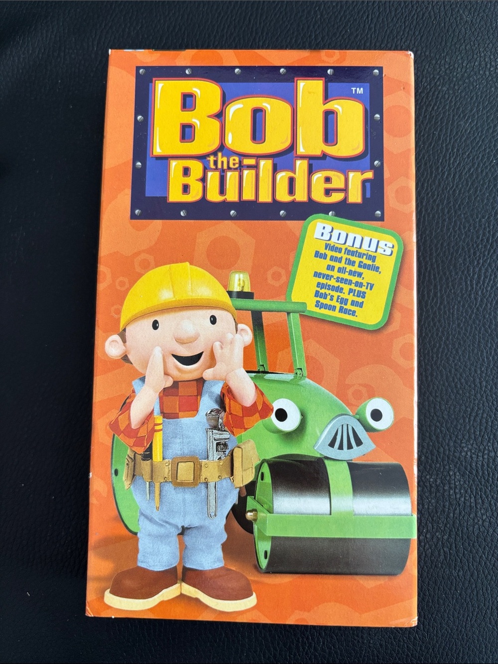 VHS Orange Packaging with Green Roller